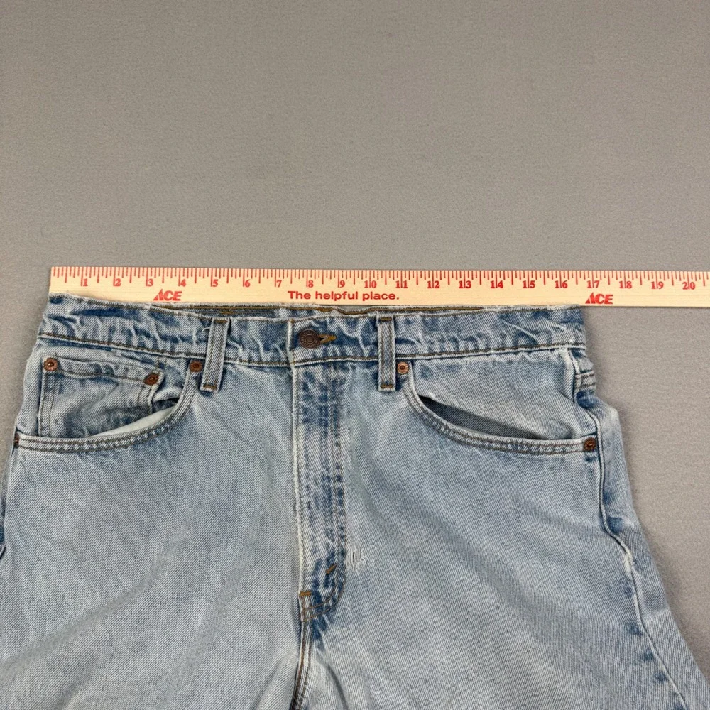 Thrashed Vintage Levis 550 Relaxed Fit Jeans Light Wash Made in USA W34 L36 90s